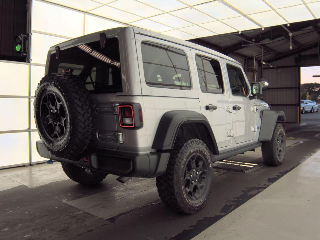 used 2023 Jeep Wrangler 4xe car, priced at $27,294