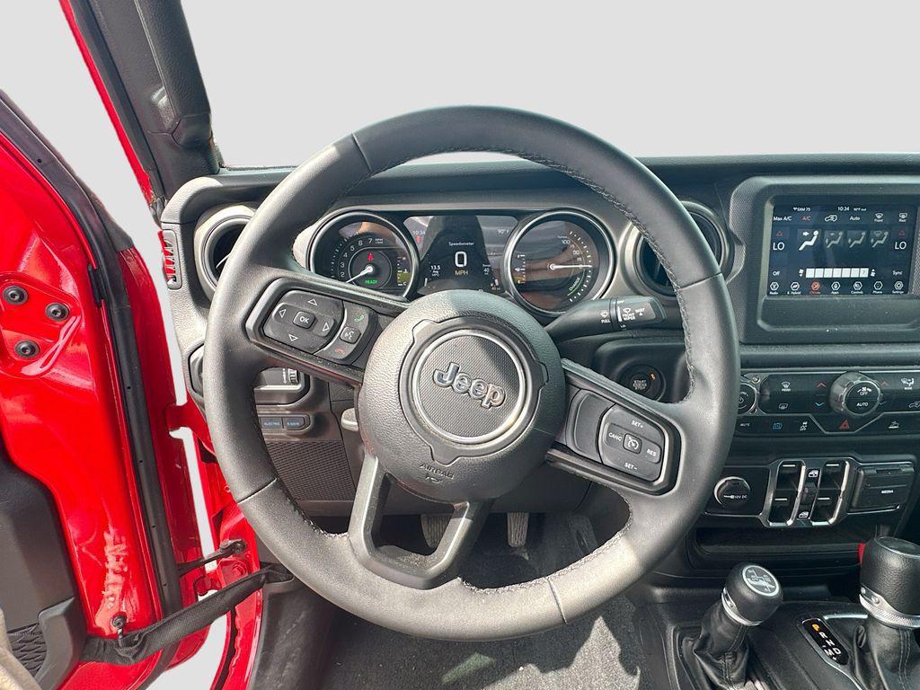 used 2023 Jeep Wrangler 4xe car, priced at $25,573
