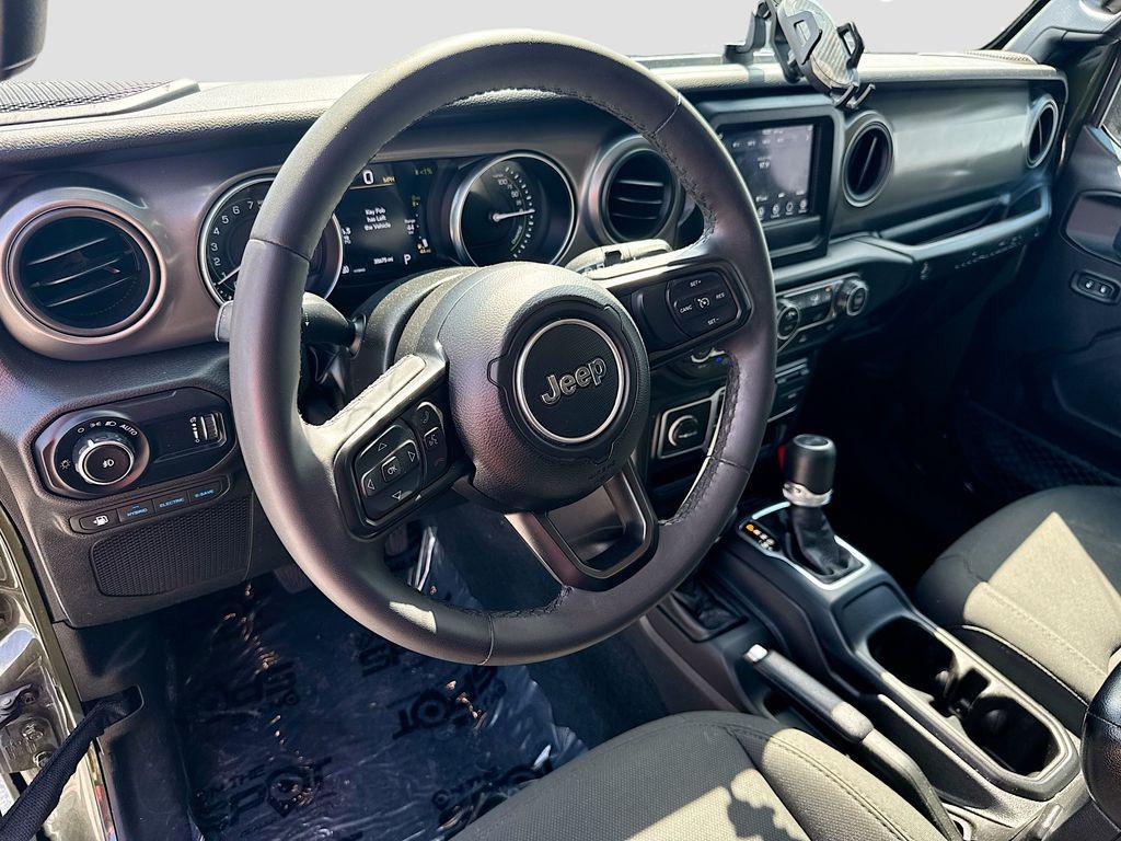 used 2023 Jeep Wrangler 4xe car, priced at $24,705