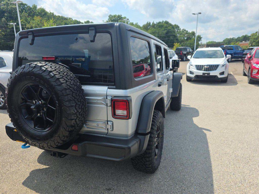 used 2024 Jeep Wrangler 4xe car, priced at $26,279