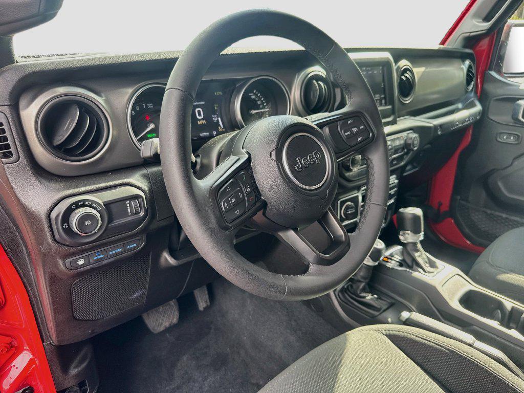 used 2023 Jeep Wrangler 4xe car, priced at $23,944