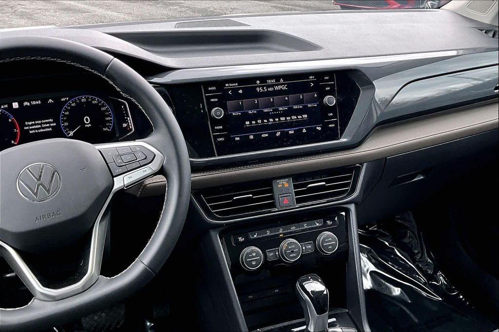 used 2023 Volkswagen Taos car, priced at $21,500