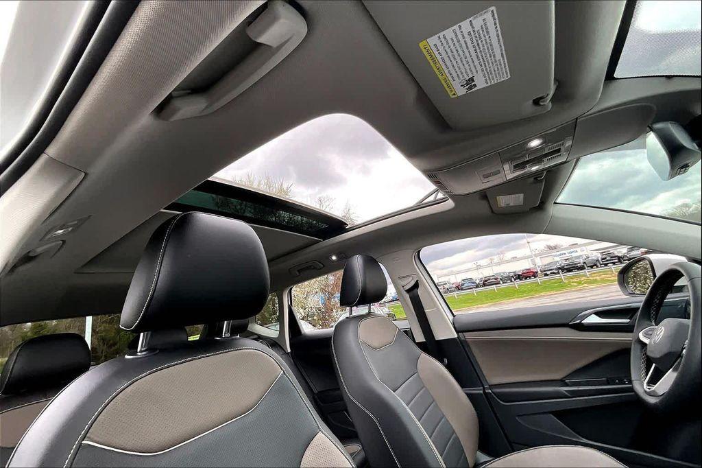 used 2023 Volkswagen Taos car, priced at $21,500