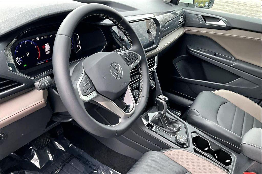 used 2023 Volkswagen Taos car, priced at $21,500