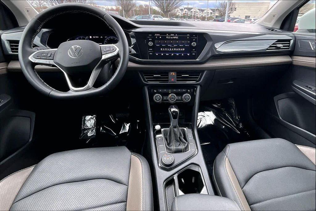 used 2023 Volkswagen Taos car, priced at $21,500