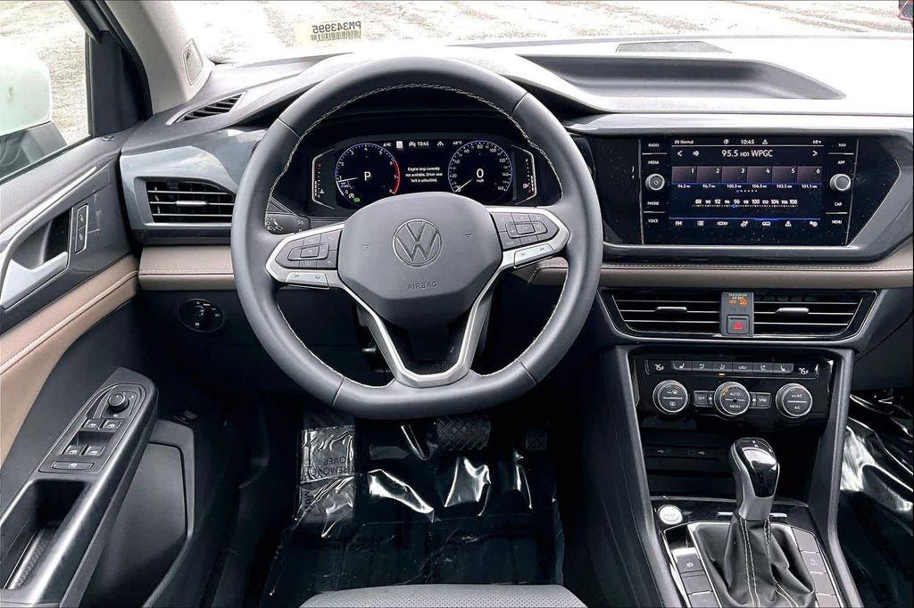 used 2023 Volkswagen Taos car, priced at $21,500