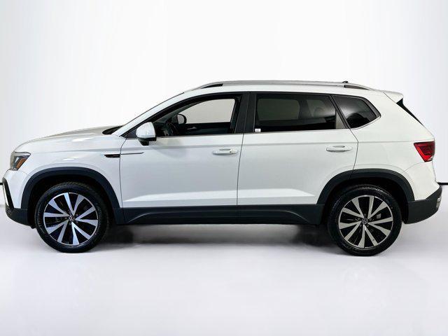 used 2023 Volkswagen Taos car, priced at $18,597