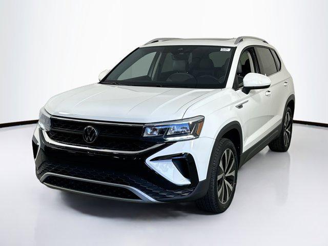used 2023 Volkswagen Taos car, priced at $18,597