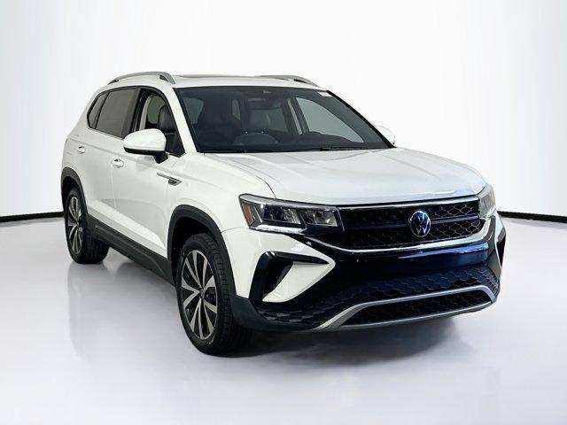 used 2023 Volkswagen Taos car, priced at $18,597