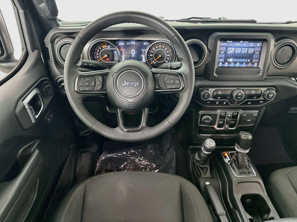 used 2023 Jeep Wrangler car, priced at $29,254