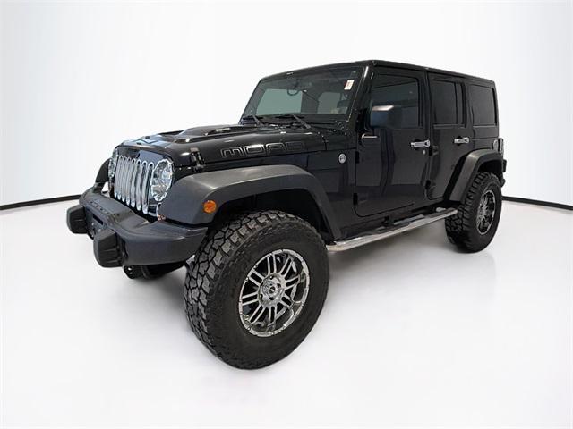 used 2013 Jeep Wrangler Unlimited car, priced at $23,895
