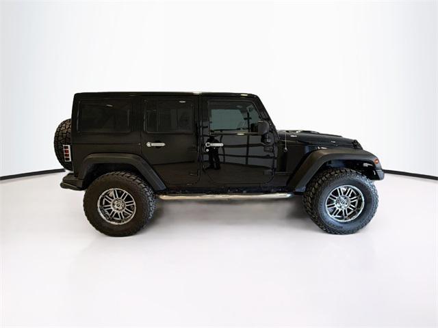 used 2013 Jeep Wrangler Unlimited car, priced at $23,895