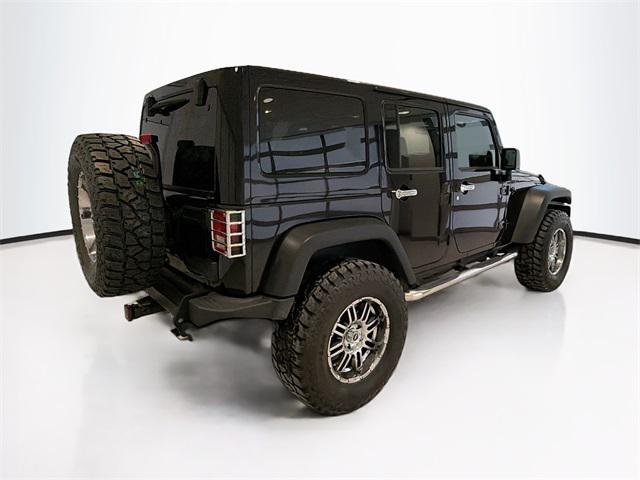 used 2013 Jeep Wrangler Unlimited car, priced at $23,895
