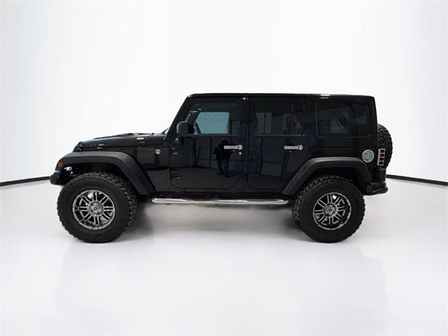 used 2013 Jeep Wrangler Unlimited car, priced at $23,895