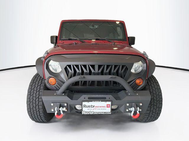 used 2013 Jeep Wrangler Unlimited car, priced at $16,599
