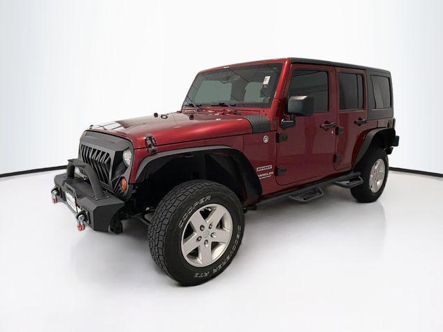 used 2013 Jeep Wrangler Unlimited car, priced at $16,599