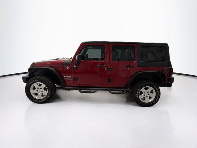 used 2013 Jeep Wrangler Unlimited car, priced at $16,599