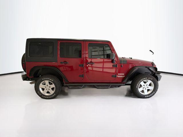 used 2013 Jeep Wrangler Unlimited car, priced at $16,599