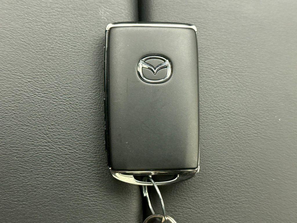 used 2024 Mazda CX-90 car, priced at $30,899