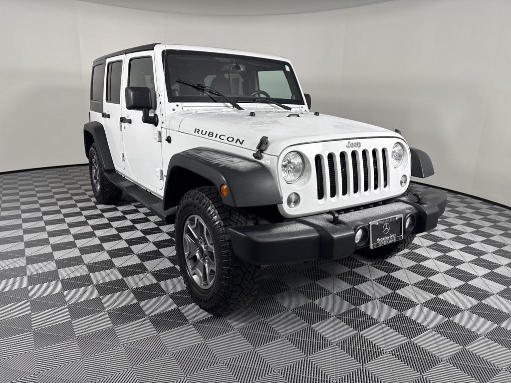 used 2014 Jeep Wrangler Unlimited car, priced at $19,494