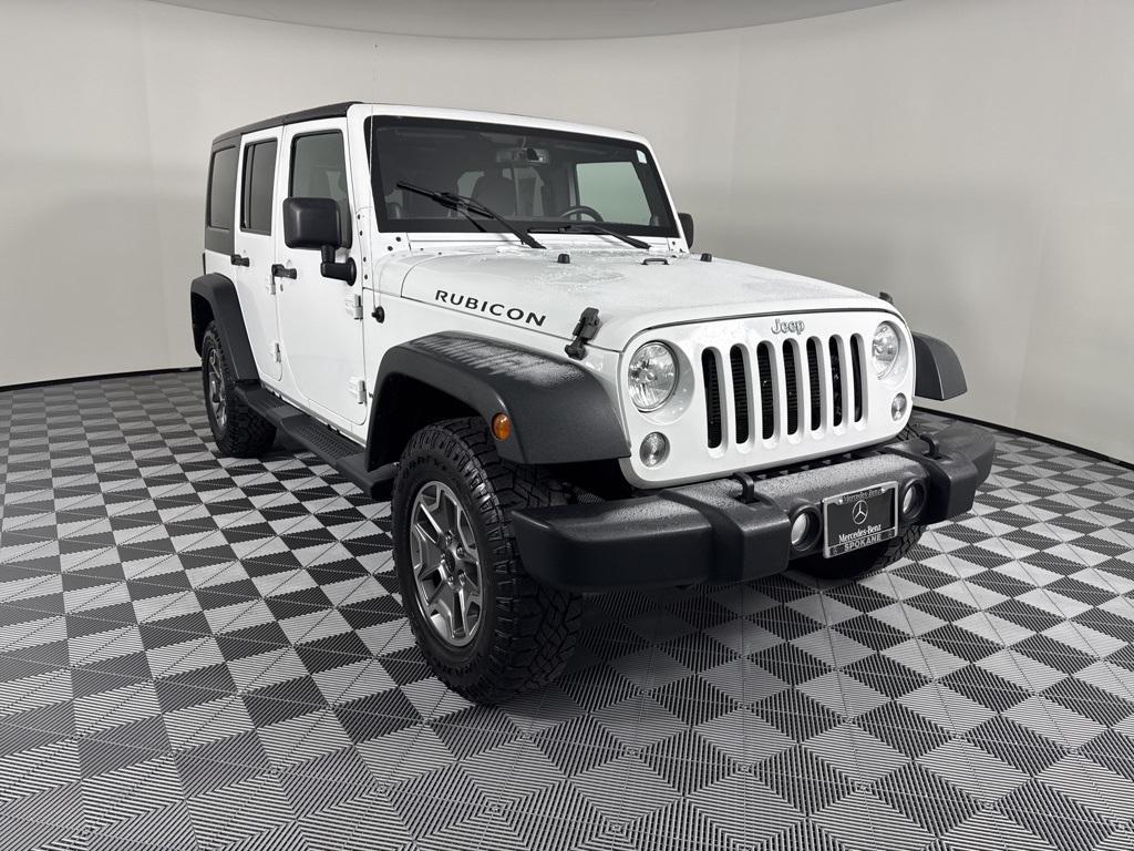 used 2014 Jeep Wrangler Unlimited car, priced at $18,990