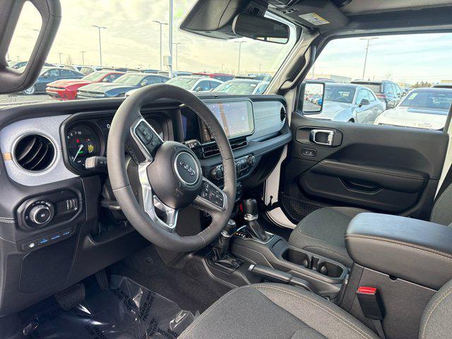 used 2025 Jeep Wrangler 4xe car, priced at $32,736