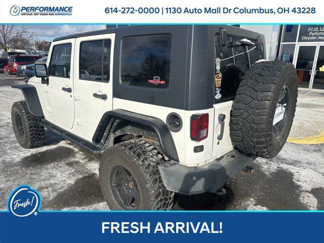 used 2010 Jeep Wrangler Unlimited car, priced at $16,501