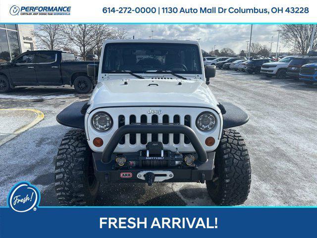 used 2010 Jeep Wrangler Unlimited car, priced at $16,501