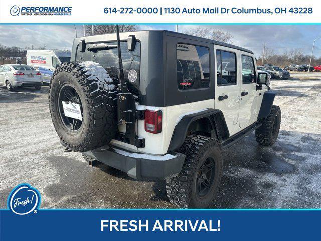 used 2010 Jeep Wrangler Unlimited car, priced at $16,501