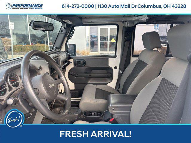 used 2010 Jeep Wrangler Unlimited car, priced at $16,501