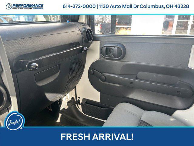 used 2010 Jeep Wrangler Unlimited car, priced at $16,501