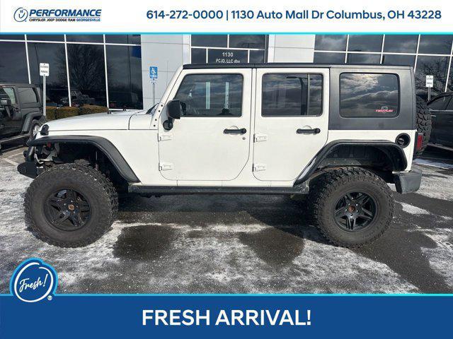 used 2010 Jeep Wrangler Unlimited car, priced at $16,501