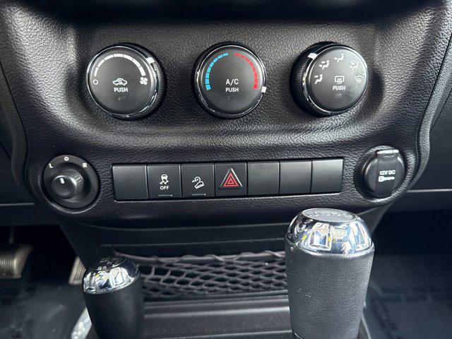 used 2015 Jeep Wrangler Unlimited car, priced at $14,996