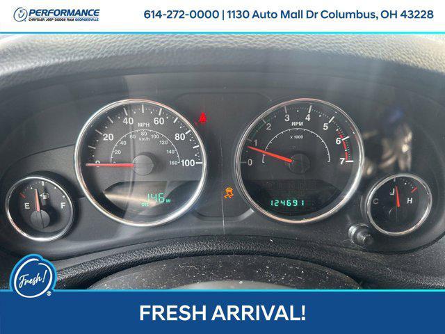 used 2011 Jeep Wrangler Unlimited car, priced at $12,336