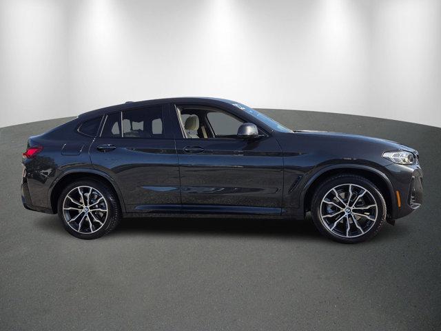 used 2022 BMW X4 car, priced at $30,988