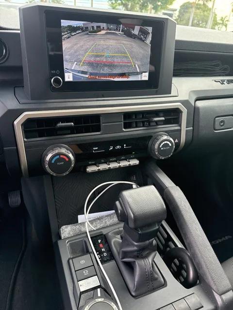 used 2025 Toyota Tacoma car, priced at $34,596