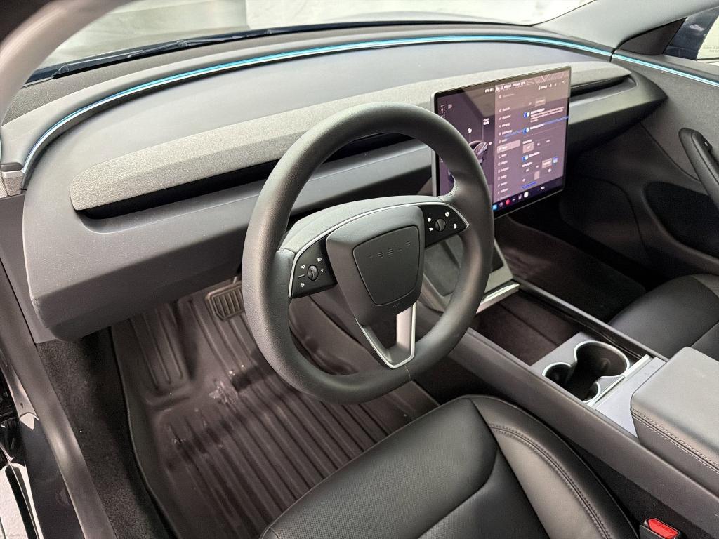 used 2025 Tesla Model 3 car, priced at $37,097