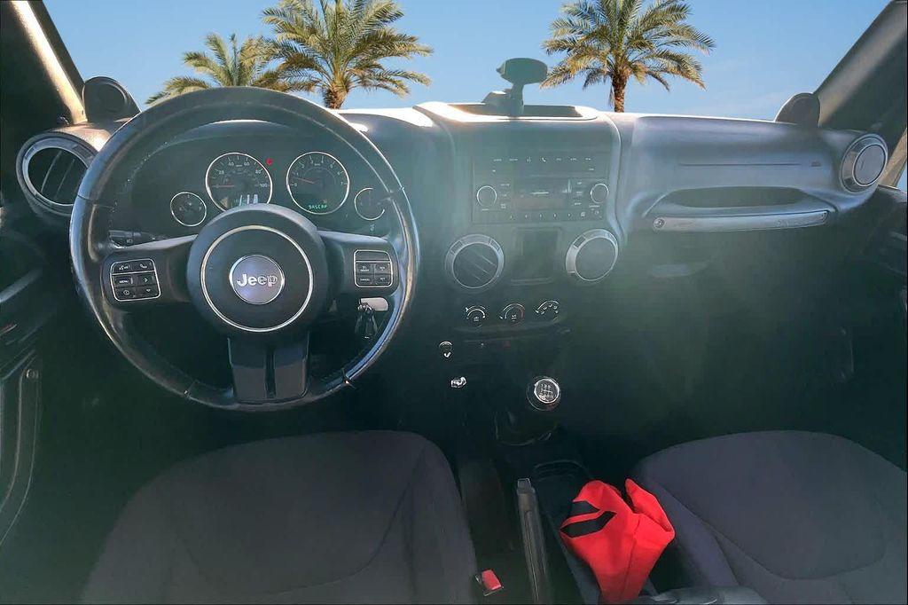 used 2013 Jeep Wrangler Unlimited car, priced at $16,075