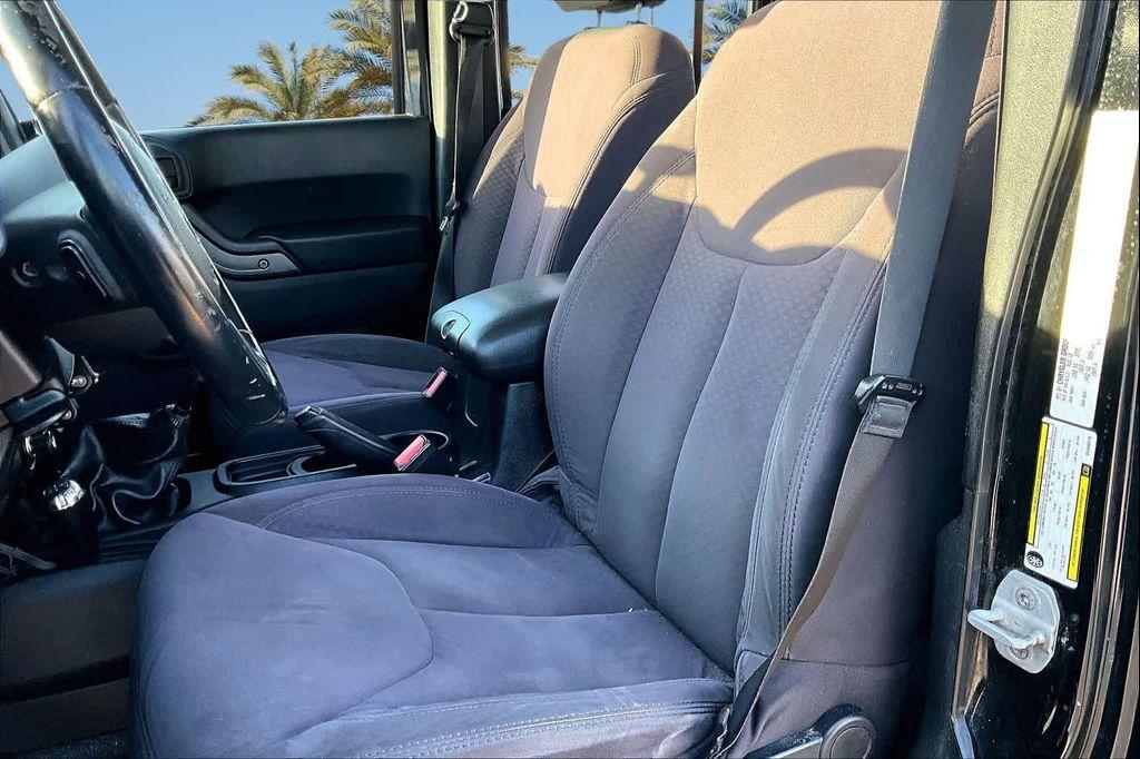 used 2013 Jeep Wrangler Unlimited car, priced at $16,075