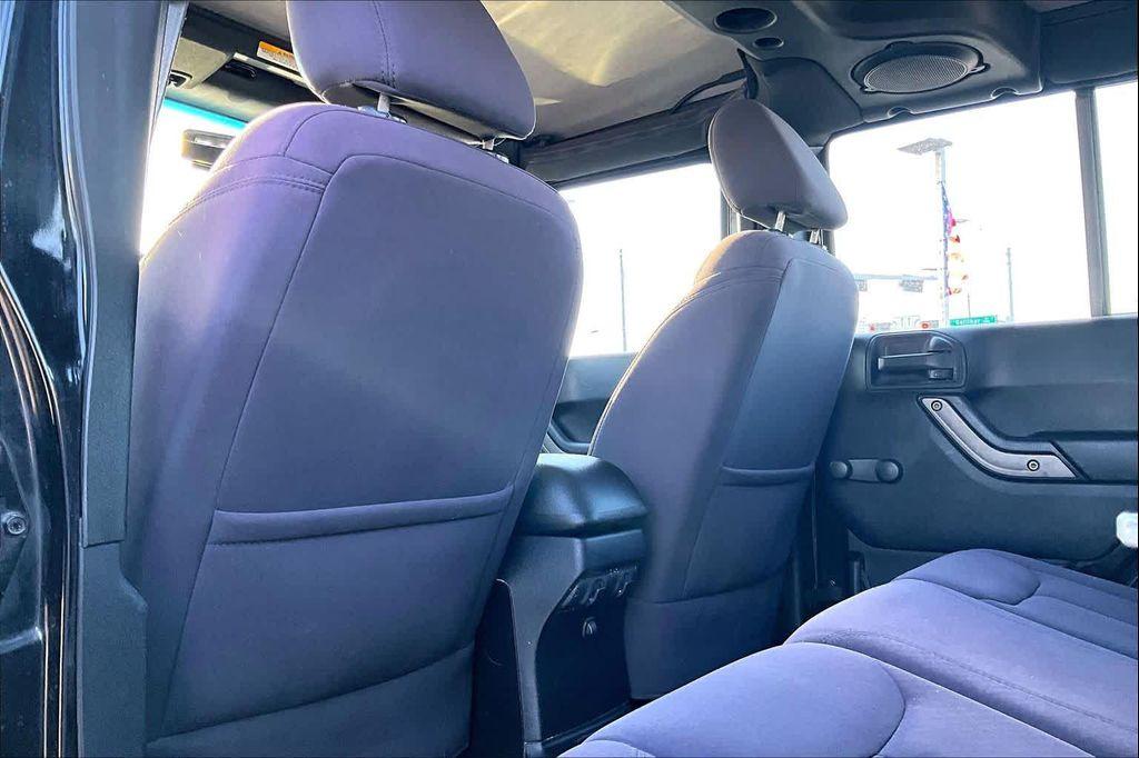 used 2013 Jeep Wrangler Unlimited car, priced at $16,075