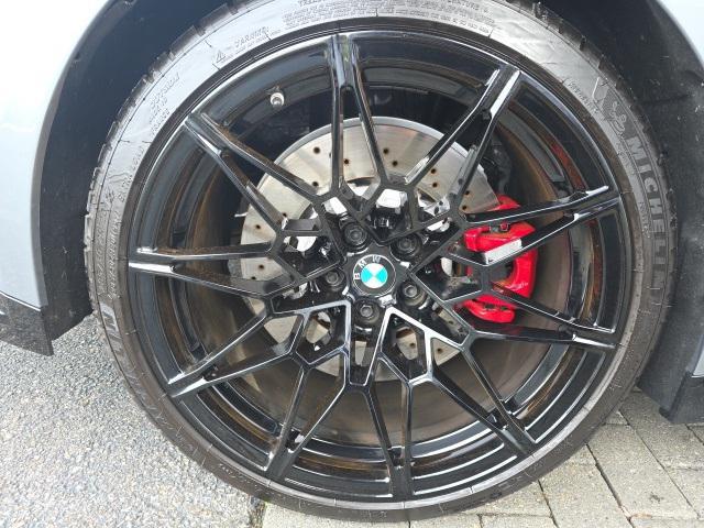 used 2024 BMW M4 car, priced at $73,876