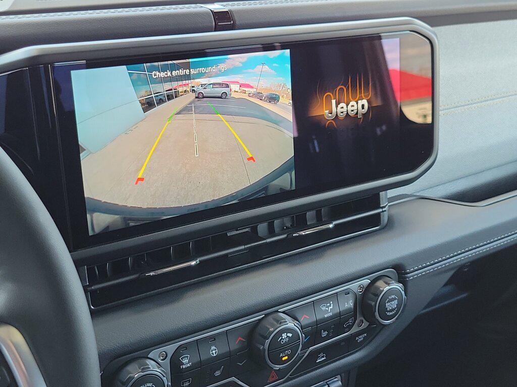 used 2025 Jeep Wrangler 4xe car, priced at $33,696