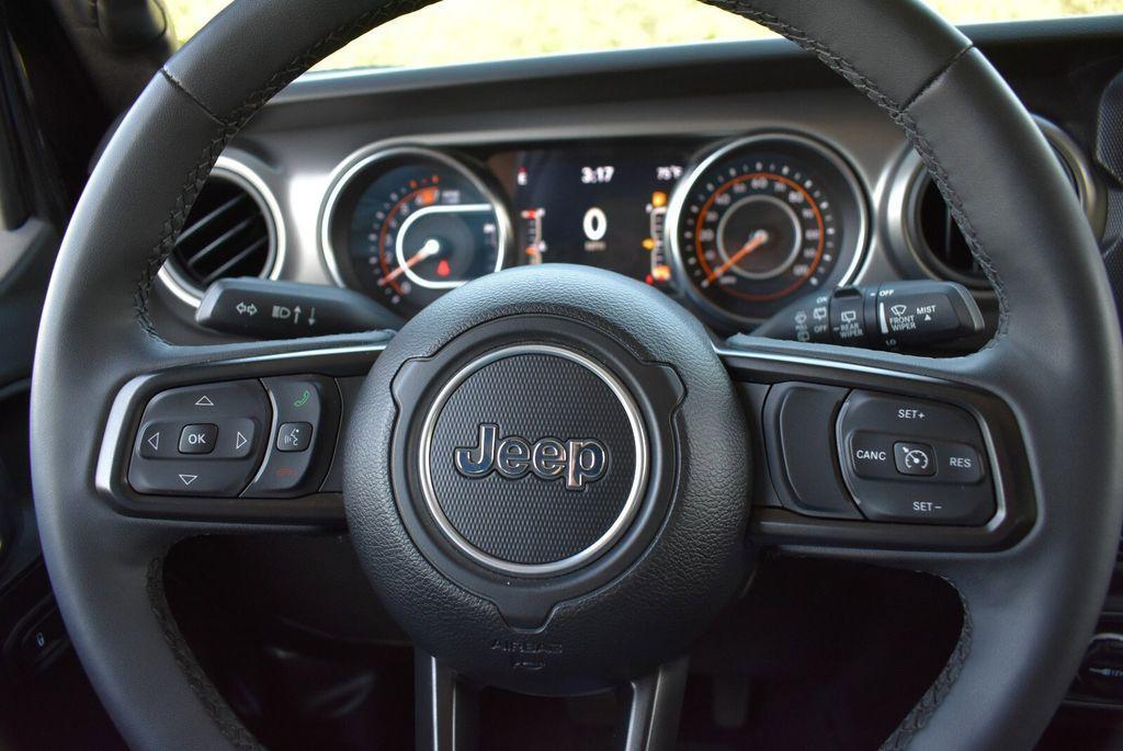 used 2023 Jeep Wrangler car, priced at $31,147