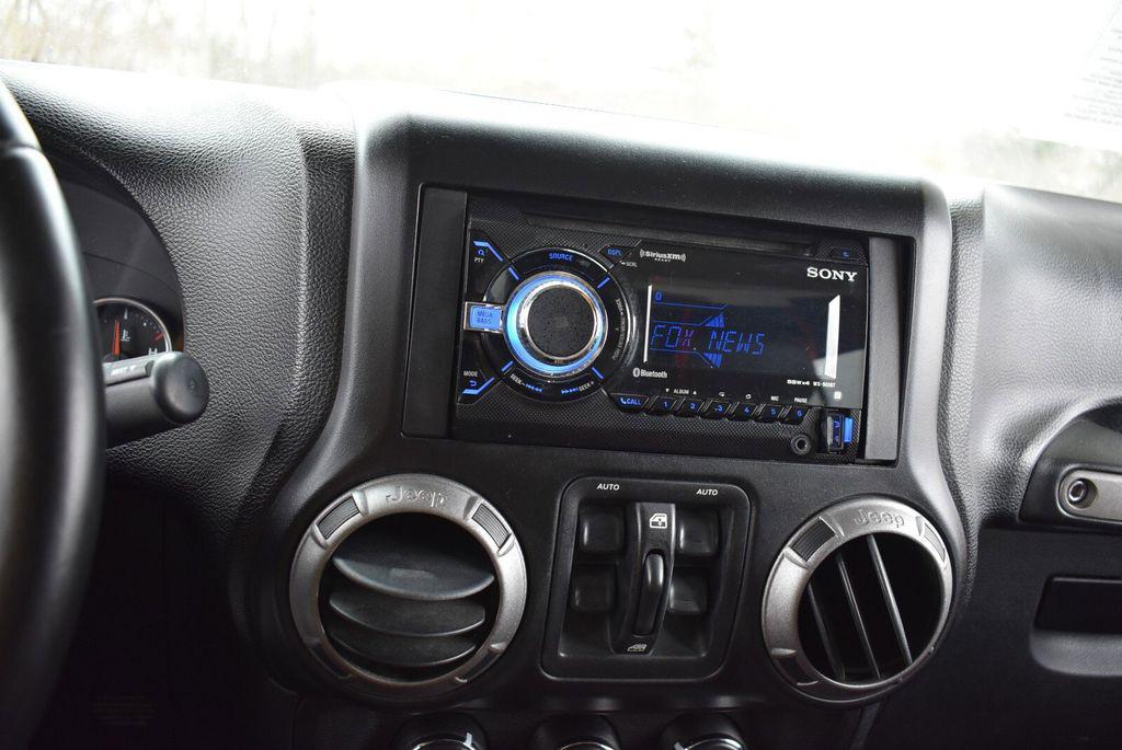 used 2012 Jeep Wrangler Unlimited car, priced at $12,698