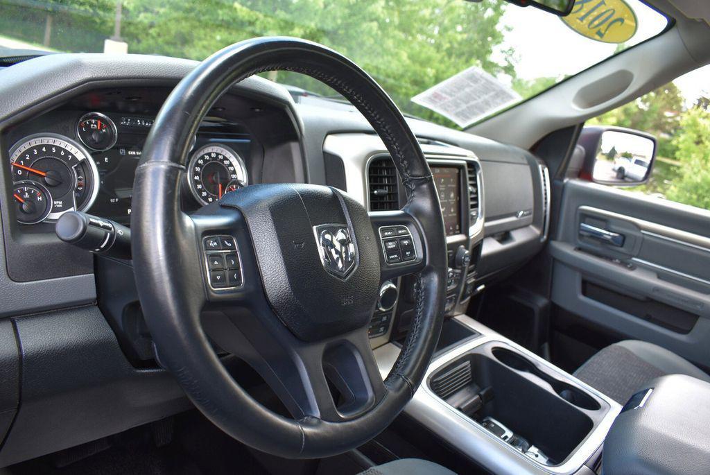 used 2018 Ram 1500 car, priced at $19,561