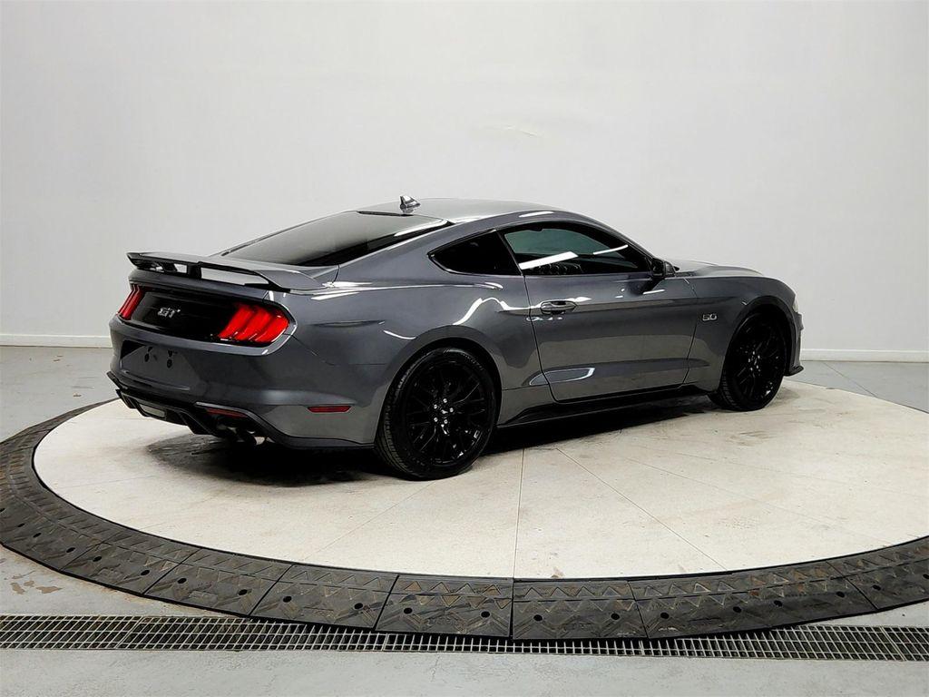 used 2021 Ford Mustang car, priced at $33,864