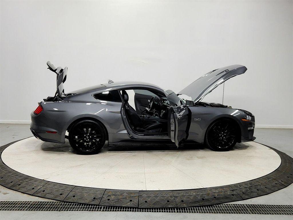 used 2021 Ford Mustang car, priced at $33,864