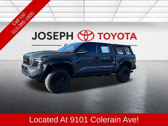 used 2025 Toyota Tacoma Hybrid car, priced at $62,235