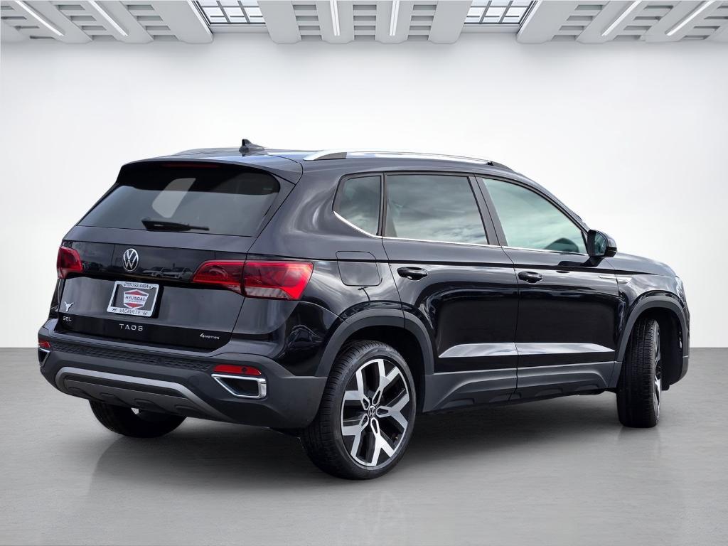 used 2022 Volkswagen Taos car, priced at $19,689