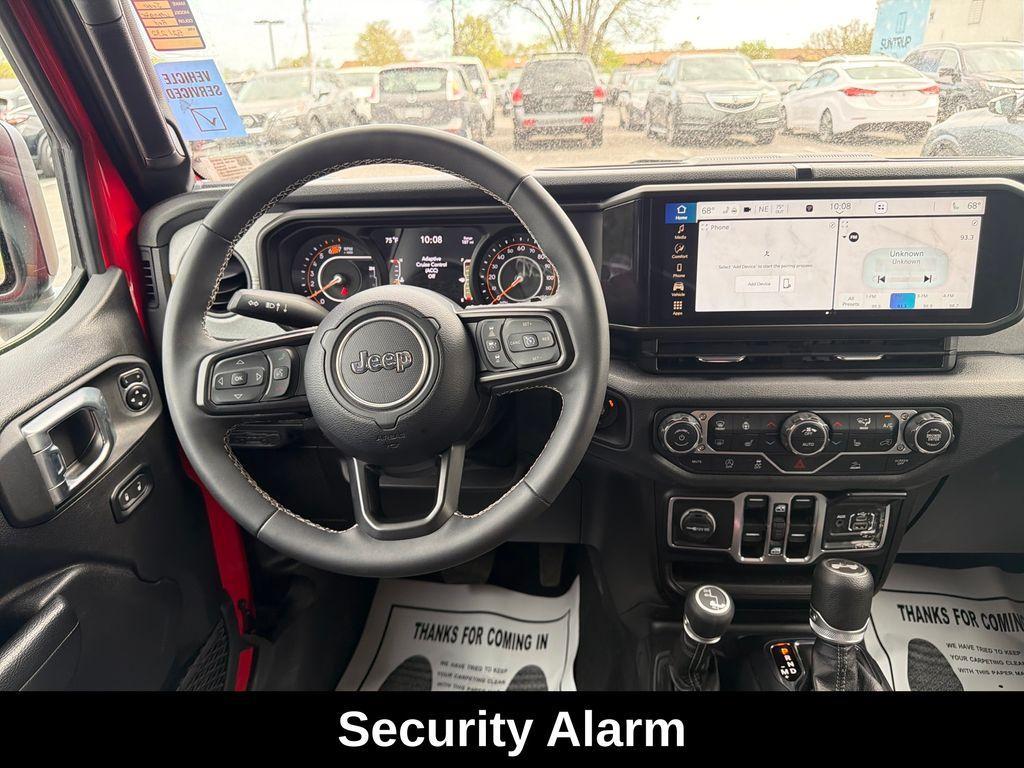 used 2025 Jeep Wrangler car, priced at $34,325